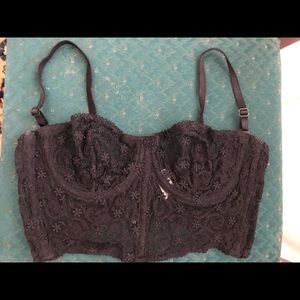 Black bustier with removable straps.
